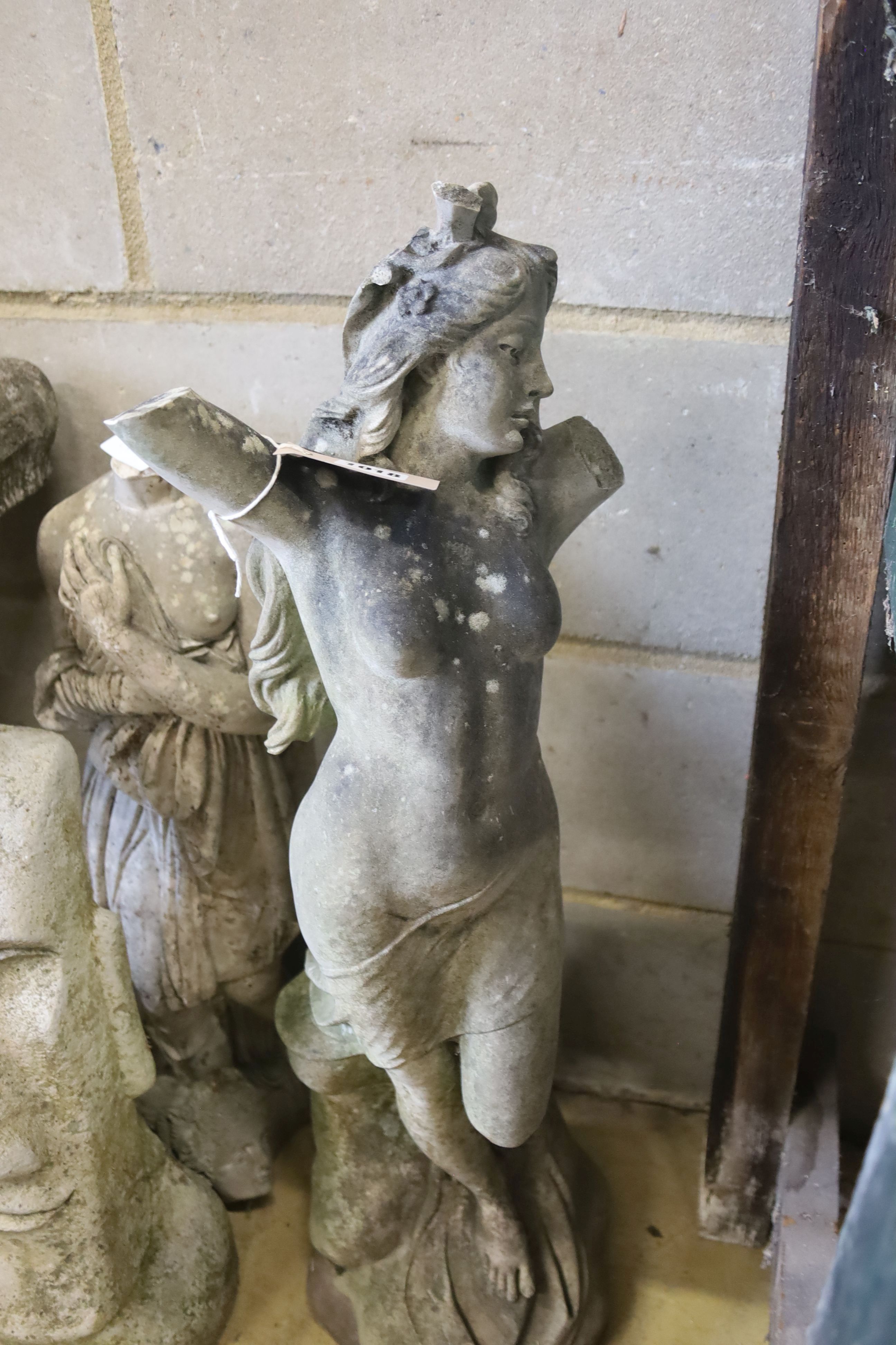 Three reconstituted stone and reconstituted marble garden ornaments, largest 80cm high